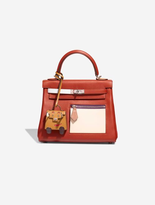 Hermès Kelly Doll Bag Charm Tadelakt / Chèvre Mysore Poussière / Rose Texas / Vert Fizz / Rouge Sellier Closing System | Sell your designer bag