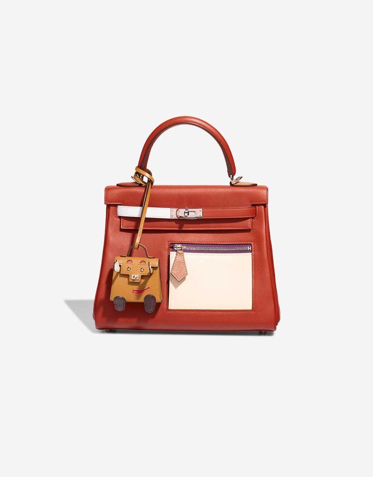 Hermès Kelly Doll Bag Charm Tadelakt / Chèvre Mysore Poussière / Rose Texas / Vert Fizz / Rouge Sellier Front | Sell your designer bag