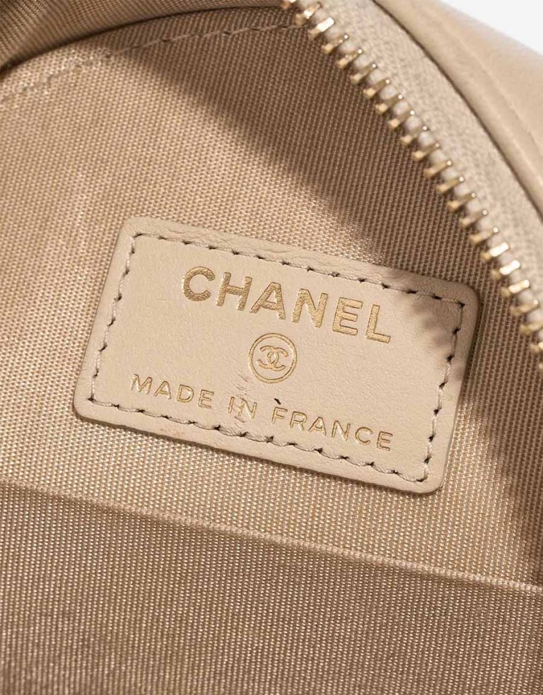 Chanel 19 Round Clutch Lamb Beige Logo | Sell your designer bag