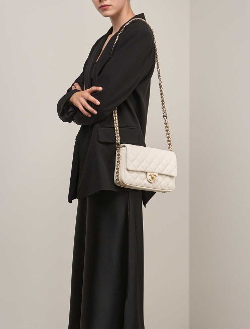 Chanel Timeless Medium Caviar White on Model | Sell your designer bag