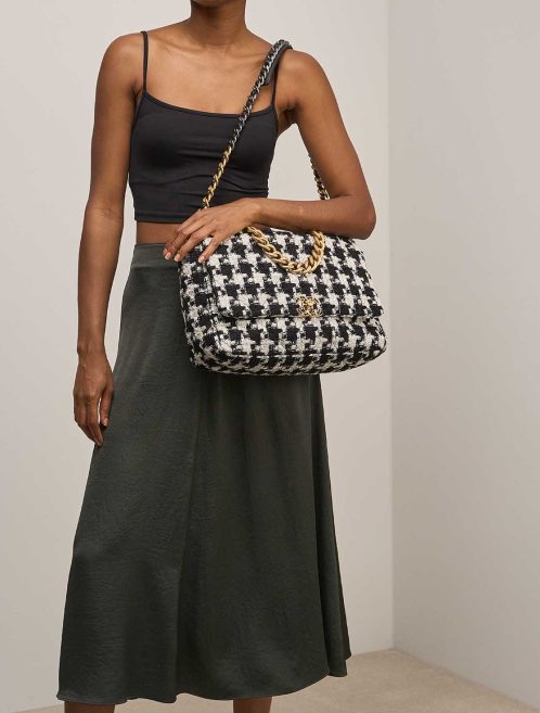 Chanel 19 Maxi Tweed Black / White on Model | Sell your designer bag