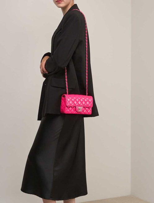 Chanel Timeless Mini Rectangular Patent Neon Pink on Model | Sell your designer bag