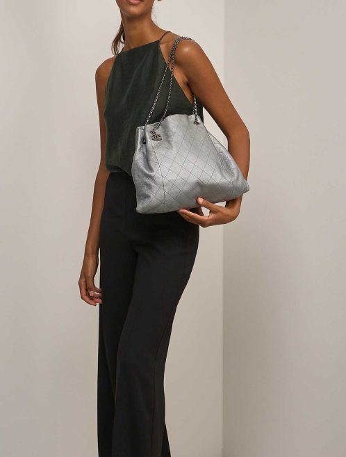 Chanel Drawstring Calf Grey on Model | Sell your designer bag