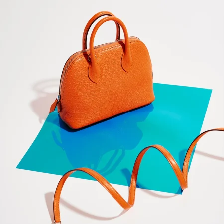 An Hermès Bolide Mini in Orange, sold on saclab.com