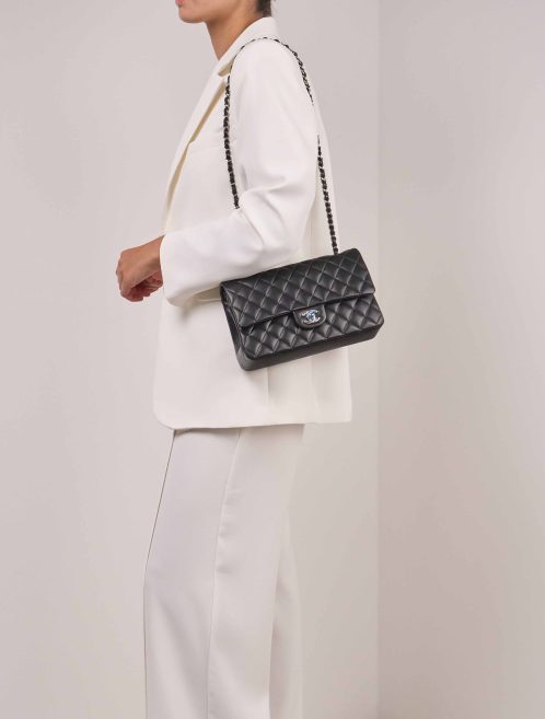 Chanel Timeless Medium Lamb Black on Model | Sell your designer bag