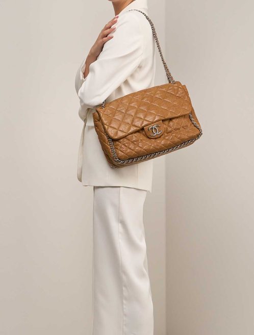 Chanel Chain Around Large Brown on Model | Sell your designer bag