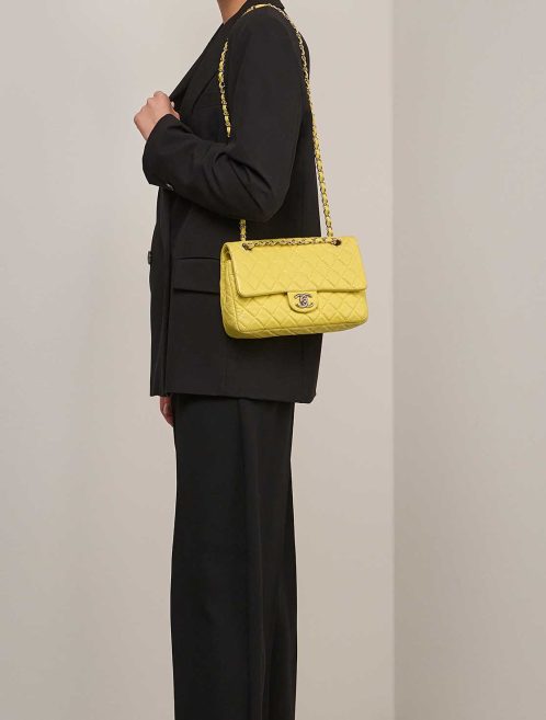 Chanel Timeless Medium Lamb Yellow on Model | Sell your designer bag