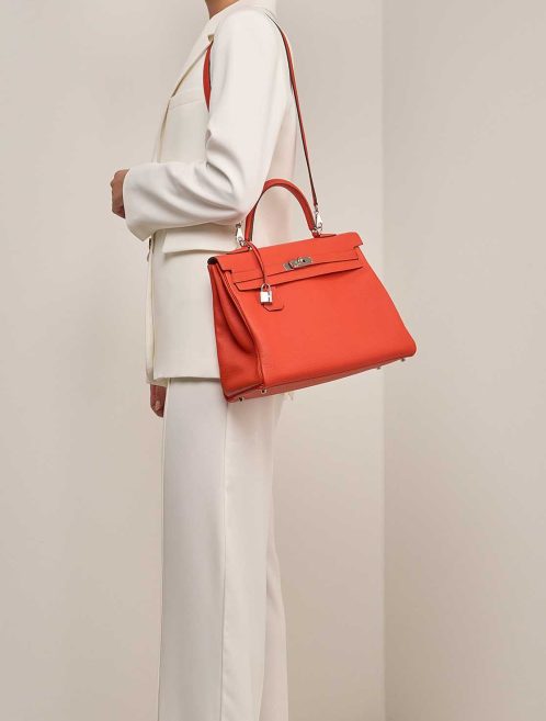 Hermès Kelly 35 Togo Capucine on Model | Sell your designer bag