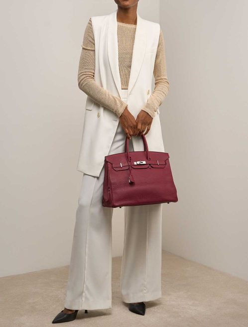 Hermès Birkin 35 Togo Dark Red on Model | Sell your designer bag