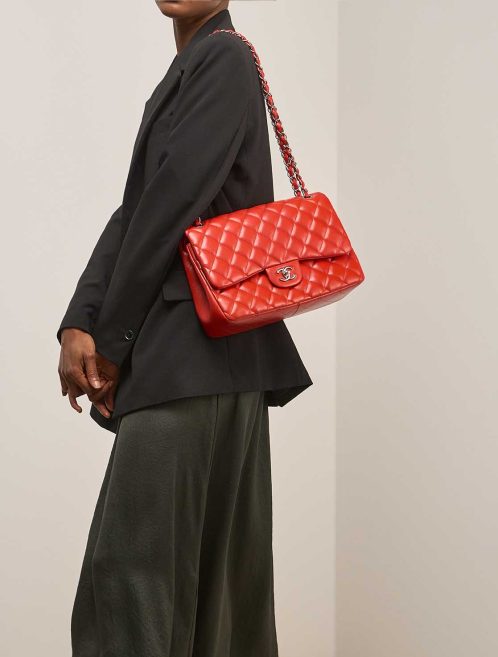 Chanel Timeless Jumbo Lamb Red on Model | Sell your designer bag