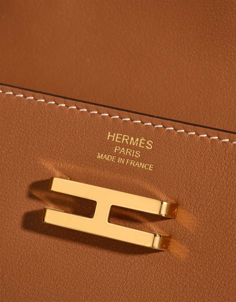 Hermès Elan Pocket 24 Swift Gold Logo | Sell your designer bag