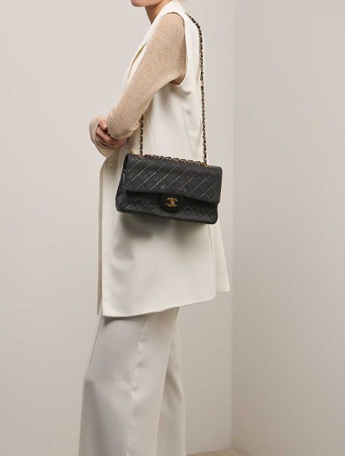 Chanel Timeless Small Lamb Black on Model | Sell your designer bag