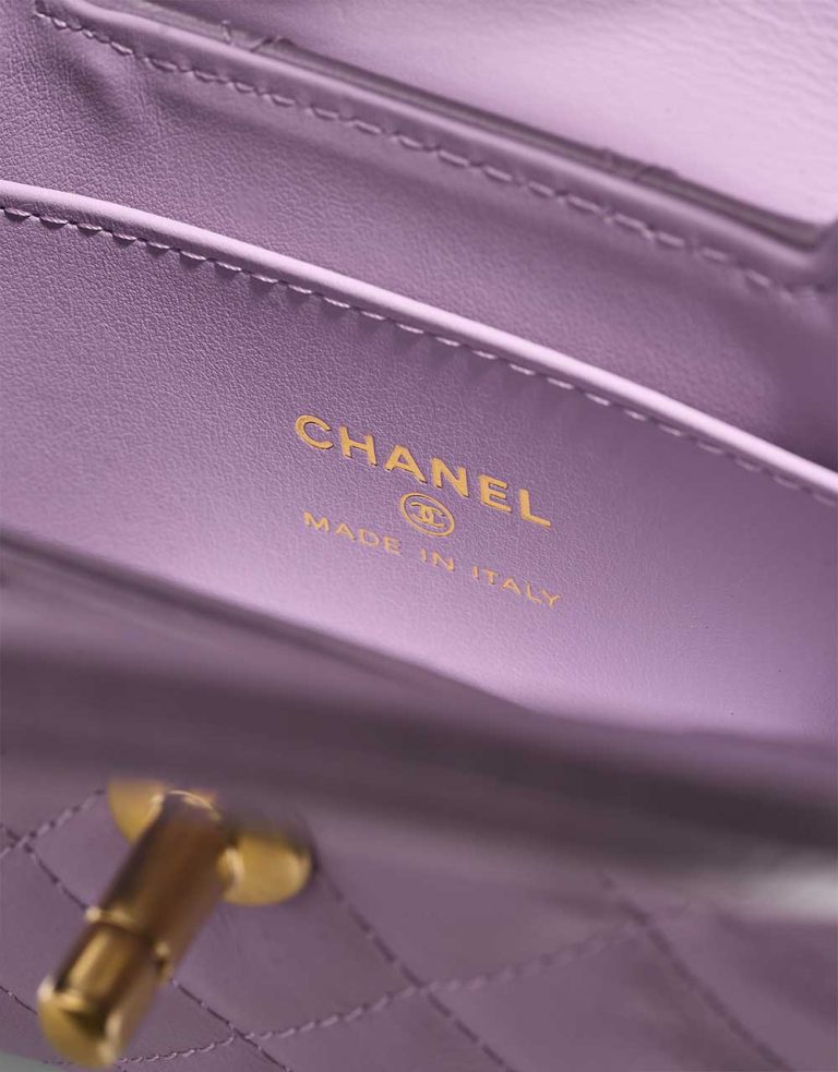 Chanel Kelly Micro Crinkled Calf Violet Logo | Sell your designer bag