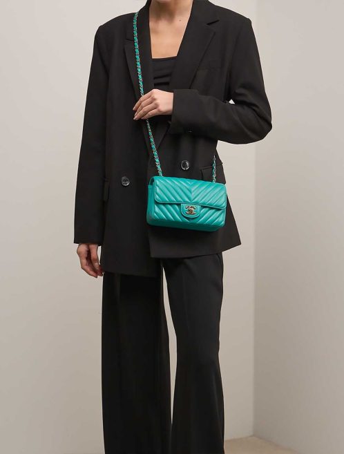 Chanel Timeless Mini Rectangular Lamb Turquoise on Model | Sell your designer bag