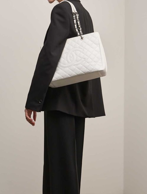 Chanel Shopping Tote GST Caviar White on Model | Sell your designer bag