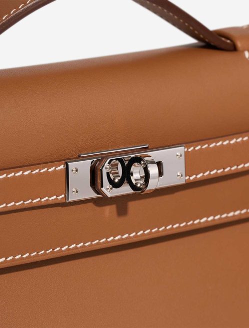 Hermès Kelly Pochette Swift Gold Closing System | Sell your designer bag