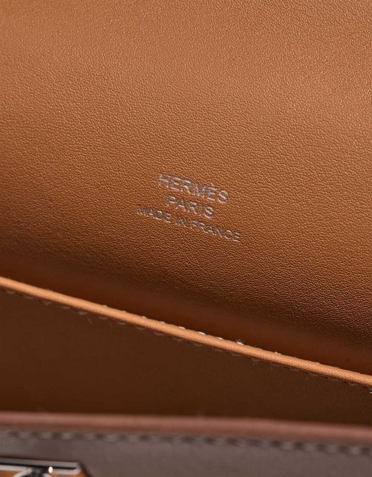 Hermès Kelly Pochette Swift Gold Logo | Sell your designer bag