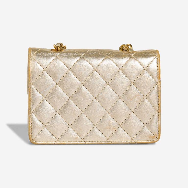 Chanel Timeless Extra Mini Lamb Gold | Sell your designer bag