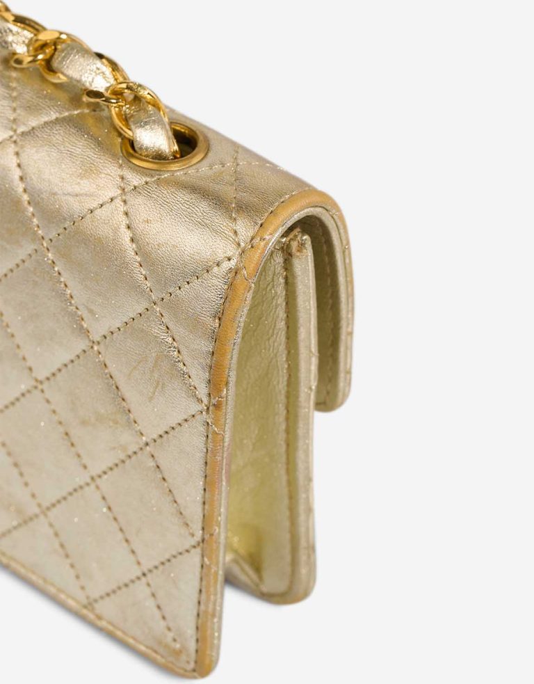 Chanel Timeless Extra Mini Lamb Gold Signs of wear | Sell your designer bag