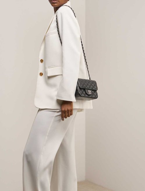 Chanel Timeless Mini Square Lamb Black on Model | Sell your designer bag