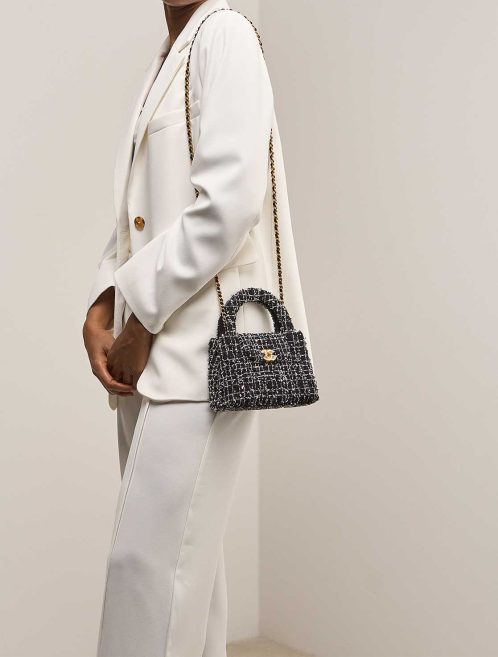 Chanel Kelly Medium Tweed Black / White on Model | Sell your designer bag