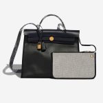 Hermès Herbag 31 Coated Toile / Vache Hunter Black / Écru / Bleu Indigo Front | Sell your designer bag