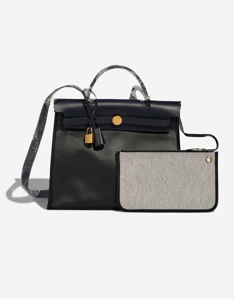 Hermès Herbag 31 Coated Toile / Vache Hunter Black / Écru / Bleu Indigo Front | Sell your designer bag