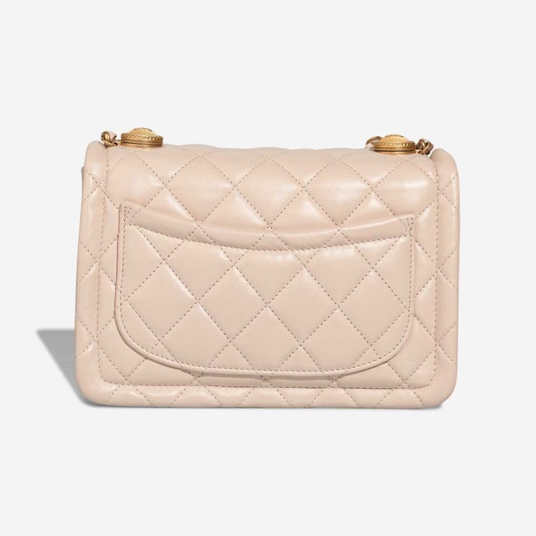 Chanel Timeless Flap Bag Small Lamb Off White | Sell your designer bag