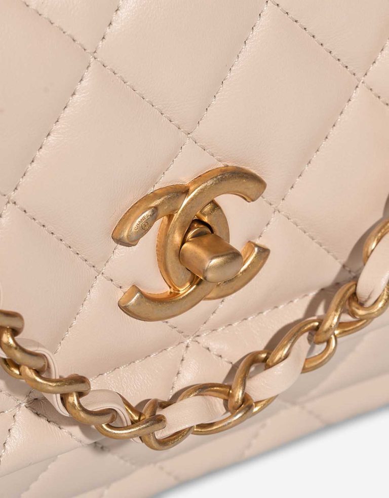 Chanel Timeless Flap Bag Small Lamb Off White Closing System | Sell your designer bag