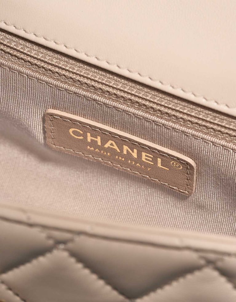 Chanel Timeless Flap Bag Small Lamb Off White Logo | Sell your designer bag