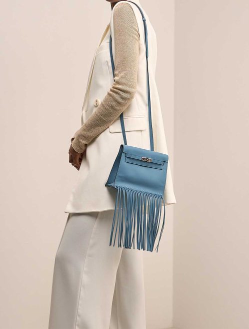 Hermès Kelly Danse Anate Swift New Bleu Jean on Model | Sell your designer bag