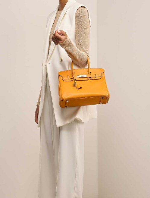 Hermès Birkin 30 Epsom Moutarde / Orange on Model | Sell your designer bag