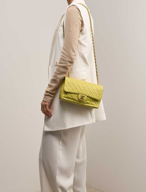 Chanel Timeless Medium Lamb Yellow on Model | Sell your designer bag