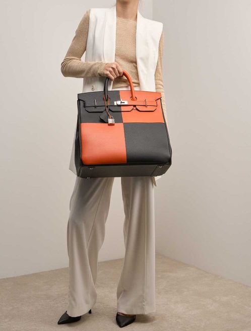 Hermès Haut à Courroies 40 Togo / Evercolor Black / Feu on Model | Sell your designer bag