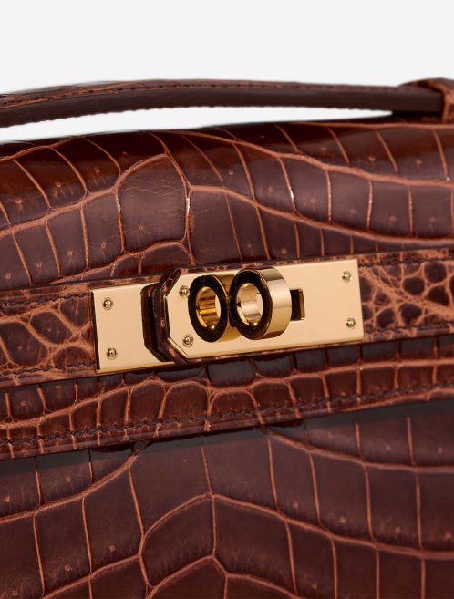 Hermès Kelly Cut Clutch Alligator Mississippi Miel Closing System | Sell your designer bag