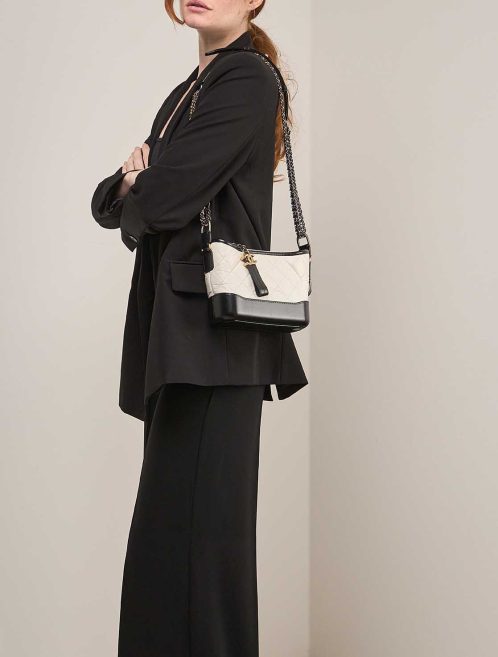 Chanel Gabrielle Small Aged Calf / Lamb Black / White on Model | Sell your designer bag