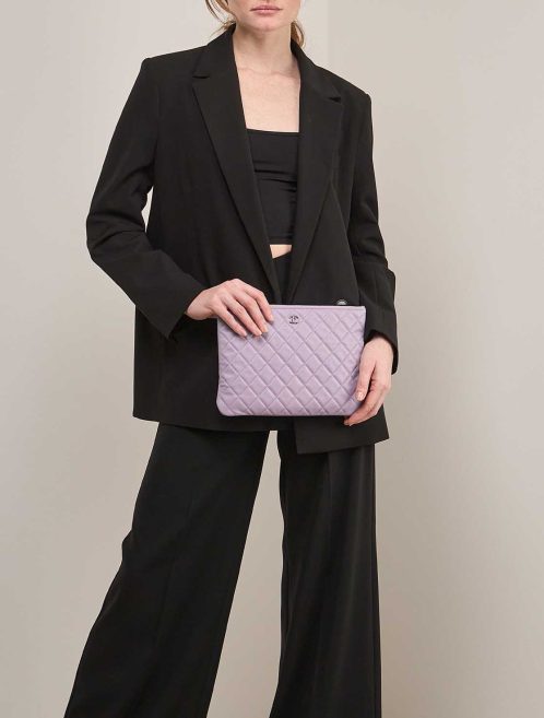 Chanel Clutch Caviar Violet on Model | Sell your designer bag