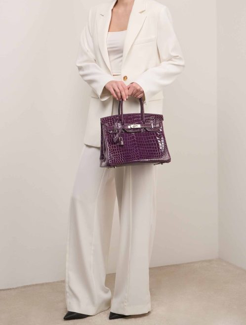 Hermès Birkin 30 Niloticus Crocodile Amethyst on Model | Sell your designer bag